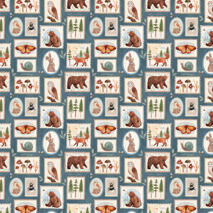 Fabric with hand-painted woodland animals, trees, mushrooms and insects in stamp-style blocks on a muted blue-grey background – perfect for kids’ clothing.