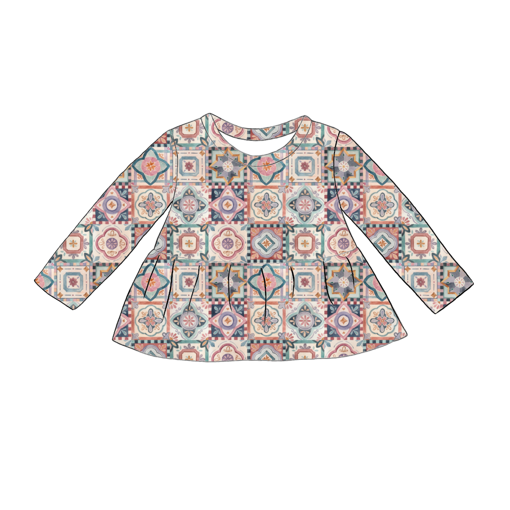 Handmade long sleeved peplum top in Faro – tile-style print in terracotta, blush, navy and green.