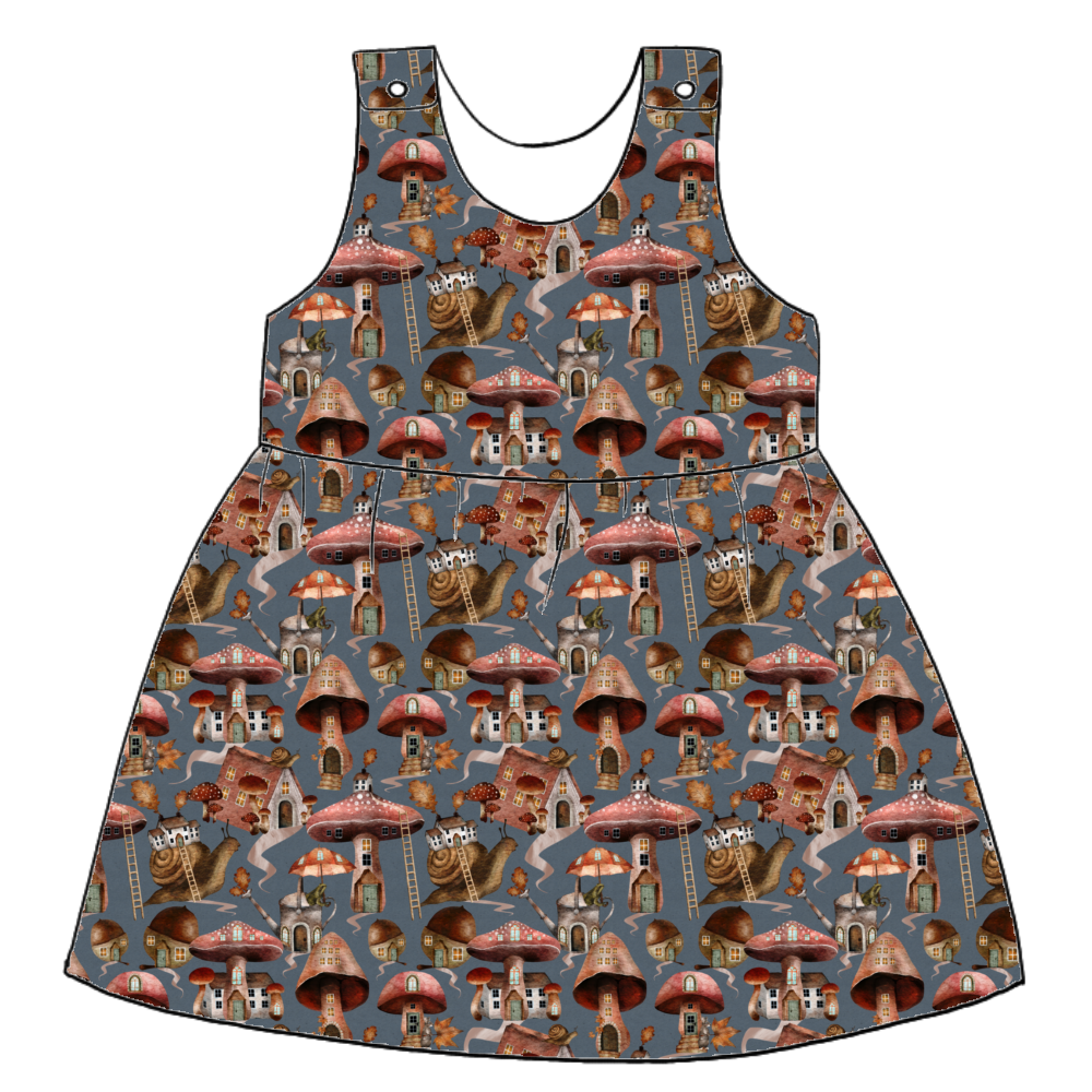 Handmade pinafore dress in Mushroom Town – blue-grey jersey with whimsical mushroom houses, snails and toadstools. Gathered skirt and popper straps.