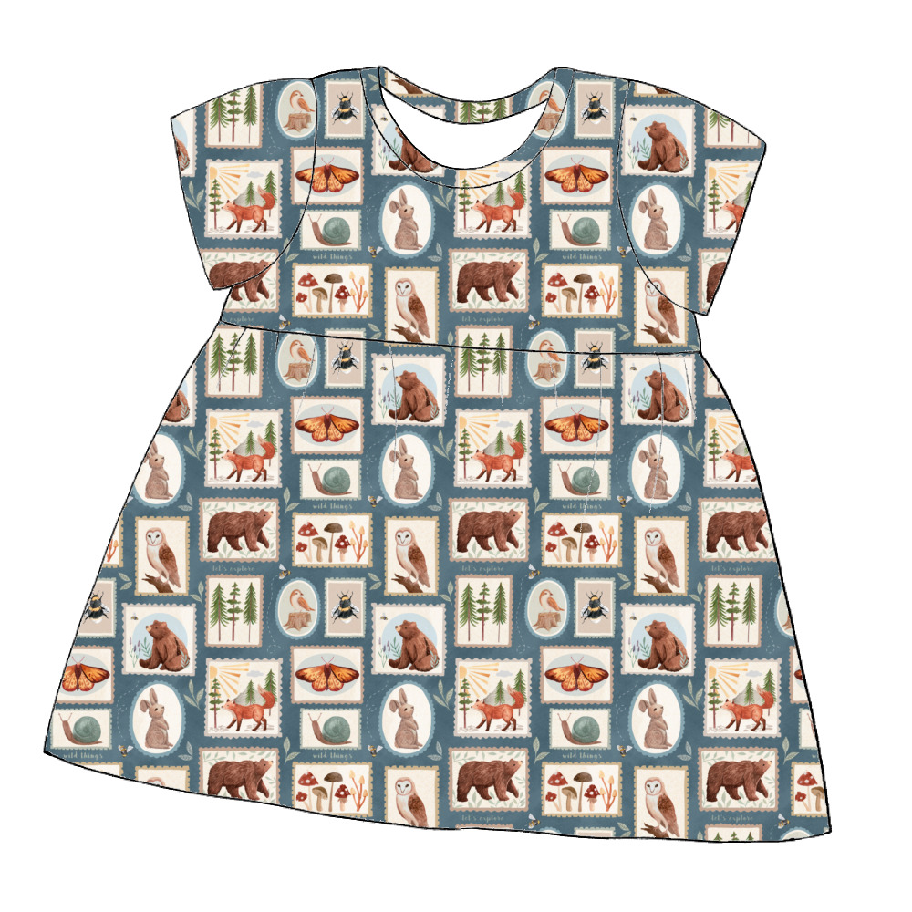 Short sleeve handmade gathered dress in Wild Stamps – soft tile print jersey with woodland animals and earthy colours.