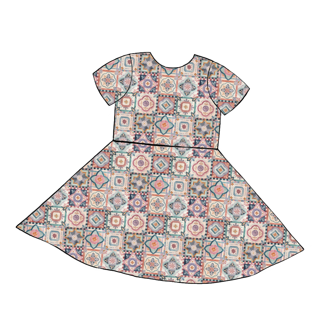 Short sleeve handmade twirly dress in Faro – soft jersey with vintage tile print in warm earthy tones.