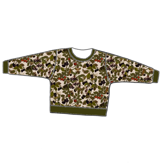 Handmade lounge sweater in Hedgerow – earthy woodland jersey with fairies, creatures and brambles, finished with ribbed cuffs and hem.
