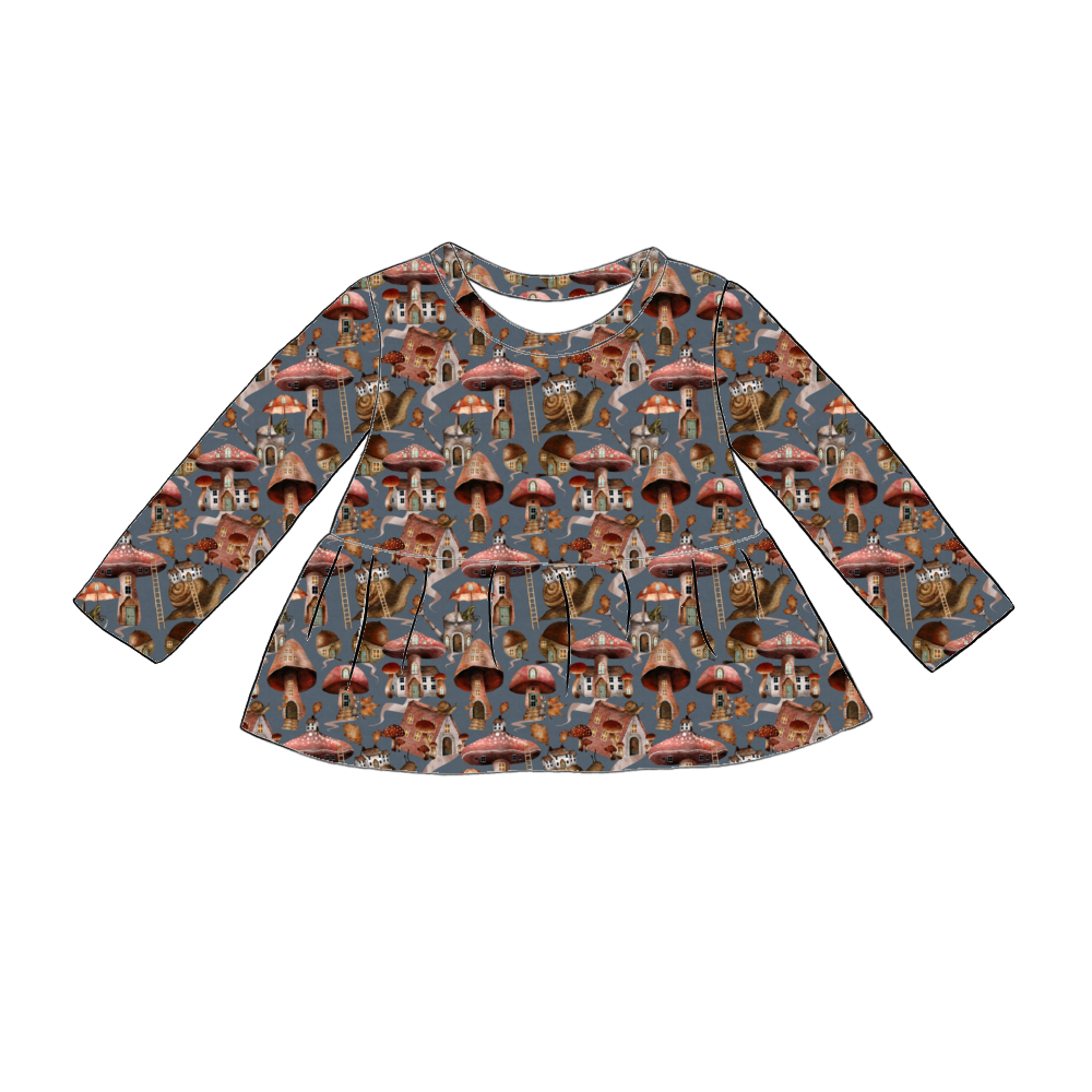 Handmade long sleeved peplum top in Mushroom Town – whimsical jersey with mushroom houses, snails and leafy toadstools on a blue-grey base.