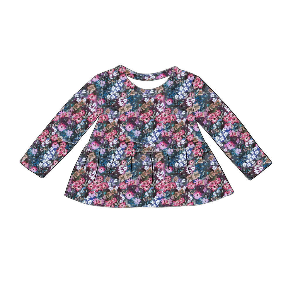 Handmade long sleeved peplum top in Matilda Floral – deep blue jersey with vibrant layered florals in pink, purple and green.