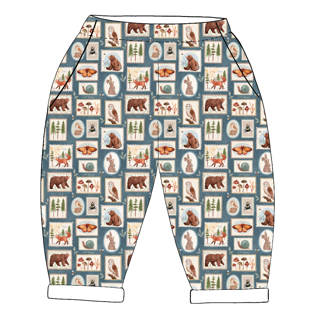 Pocket pants with a forest animal pattern on a white background