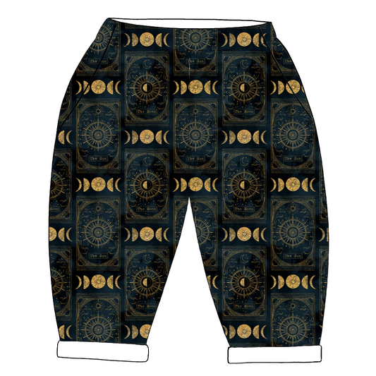 Celestial handmade trousers in Tarot – black jersey with gold tarot illustrations, rolled hems and elastic waist.