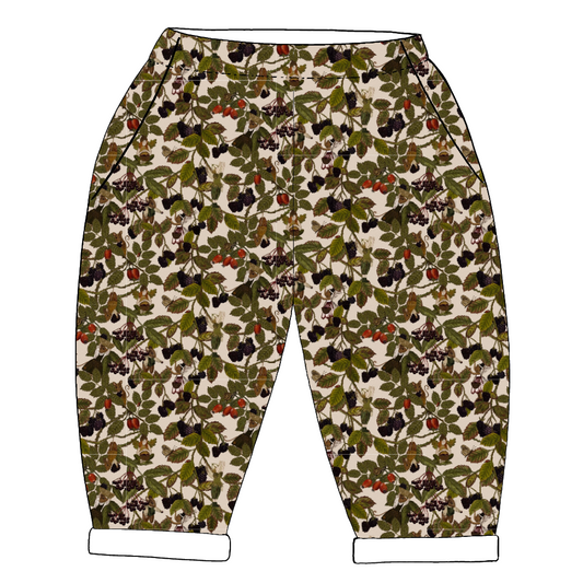 Handmade children's trousers in Hedgerow – soft woodland fabric with fairies, berries, leaves and mice, finished with pockets and a rolled hem.