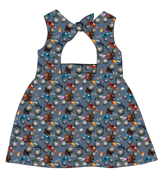 Bow Back Dress in Monster Trucks – deep blue jersey with monster trucks, flames and racing flags, finished with lined bodice and bow at the back.