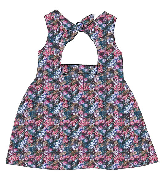 Bow Back Dress in Matilda Floral – deep blue jersey with layered painterly florals in fuchsia, violet and green, featuring a lined bodice and bow tie back.