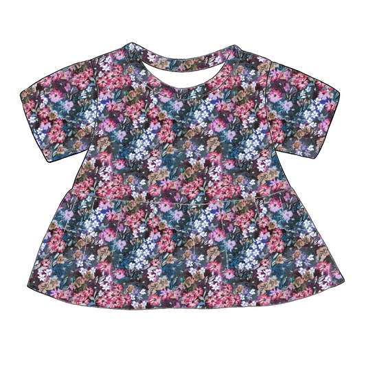 Handmade short sleeved peplum top in Matilda Floral – deep blue jersey with vibrant layered florals in pink, purple and green.