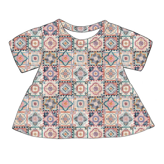 Handmade short sleeved peplum top in Faro – tile-style print in terracotta, blush, navy and green.