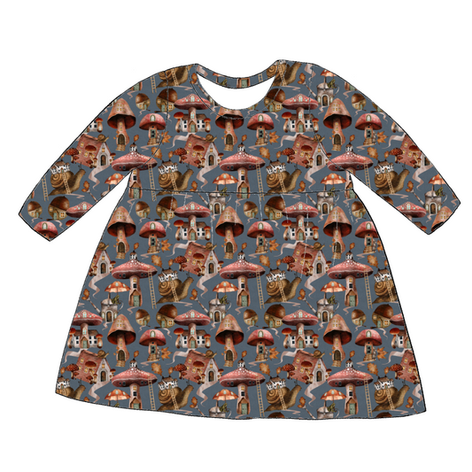 Long sleeve handmade gathered dress in Mushroom Town – blue-grey jersey with whimsical mushroom houses, snails and leaves.