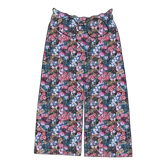 Paperbag trousers in Matilda Floral – bold print with deep blue, fuchsia and violet flowers, wide leg silhouette and feature bow.