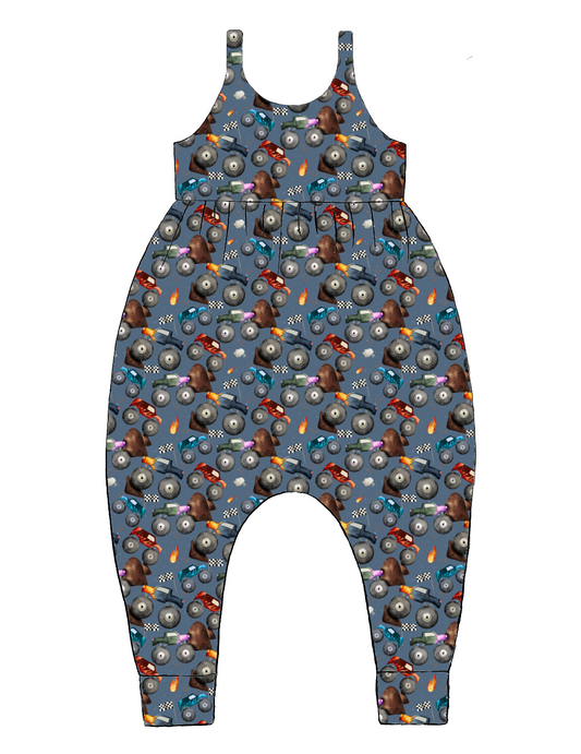 Handmade Napa Romper in Monster Trucks – blue jersey with monster trucks, flames and flags. Harem fit with soft cuffs and pull-on straps.
