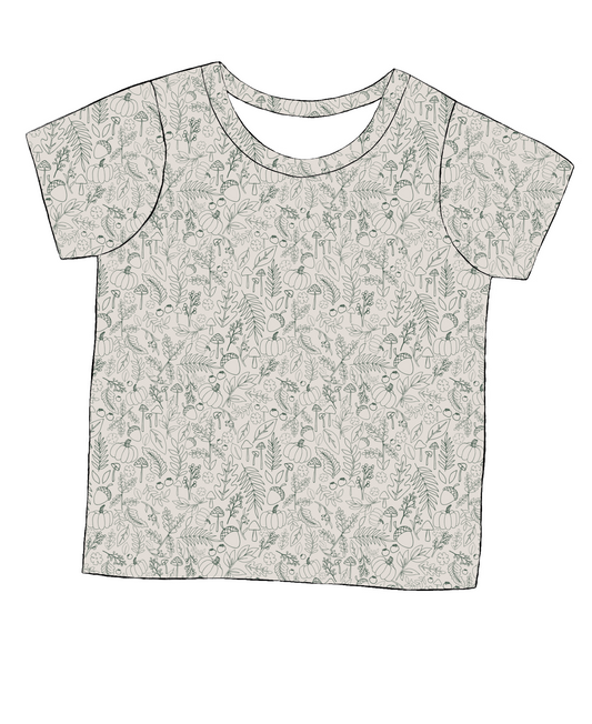 Short sleeve handmade T-shirt in Autumn Outlines – beige jersey with green line-drawn botanical design.
