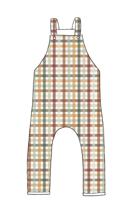 Children’s dungarees in Harvest Gingham – rust, mustard, sage and cream check with rolled hems and jersey straps.