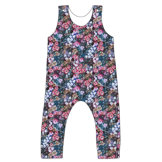 Standard jersey romper in Matilda fabric – deep-toned background with dramatic pink and purple floral print, popper shoulders and harem-style fit.